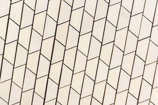 Angled white tile pattern perspective close up
