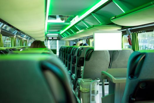 Row of comfortable seats inside a modern tourist bus