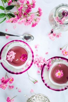 retro porcelain cup of hot rose tea