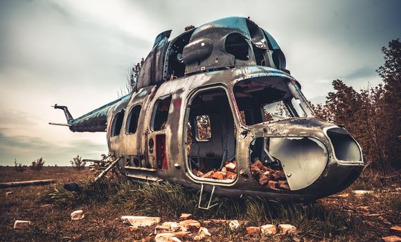 Abandoned helicopter at the airfield