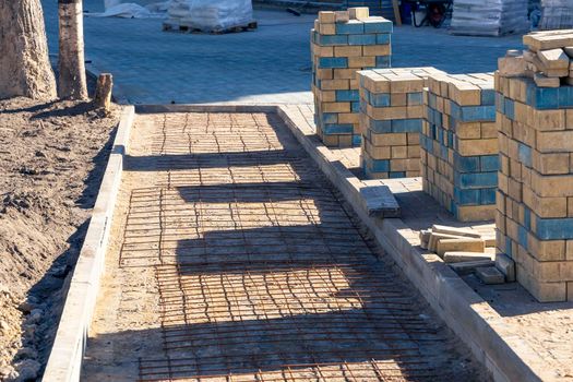 stacks of paving slabs for paving paths stacked on a construction site