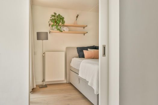 Light bedroom with wooden wardrobe