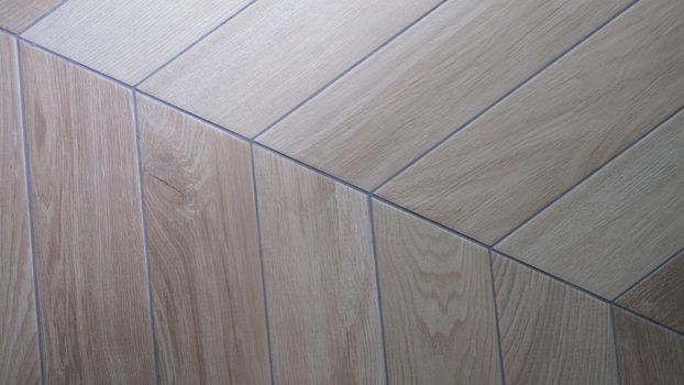 Oak texture of floor with tiles imitating parquet