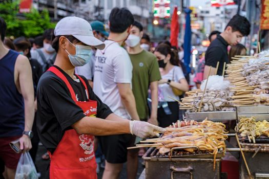 Grilled squid, China town Bangkok Thailand, Calamari fish bbq on the market