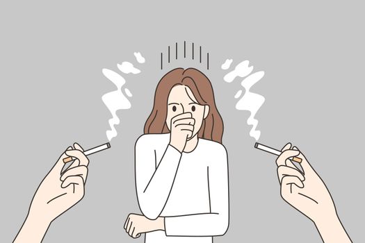 Unhappy woman suffer from passive smoking