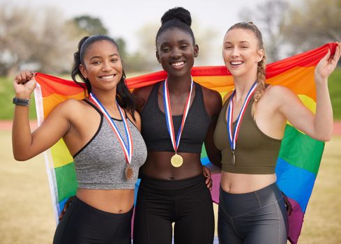 The olympics is for everyone. Cropped portrait of three attractive young female athletes celebrating their teams victory.