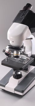 Microscope on gray background Microbiology and healthcare