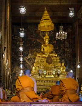 Wat Pho temple in Bangkok Thailand, The reclining buddha temple in Bangkok, Buddhist mons by temple