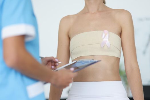 Doctor examination of female breast and oncology
