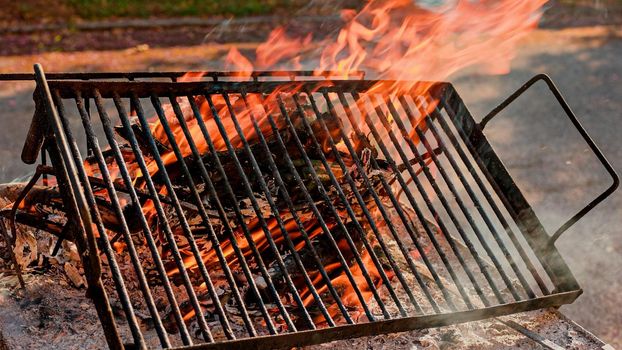 Detail of grill grid on fire