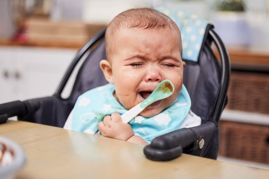 Why do I love food this much. a baby crying while eating a meal.