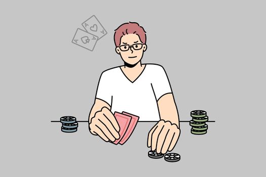 Man playing poker at table