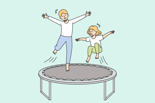 Happy kids jumping on trampoline