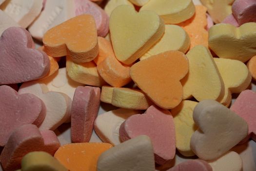 Pastel colored candy hearts