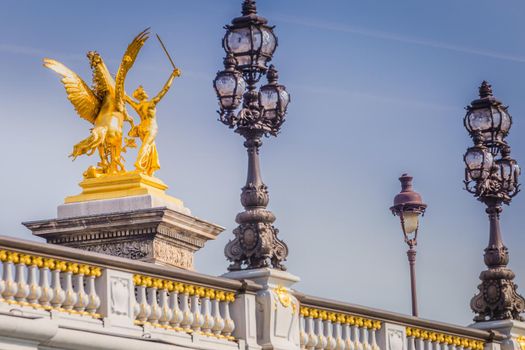 Street lights and statues in Pont Alexandre III, Paris, france