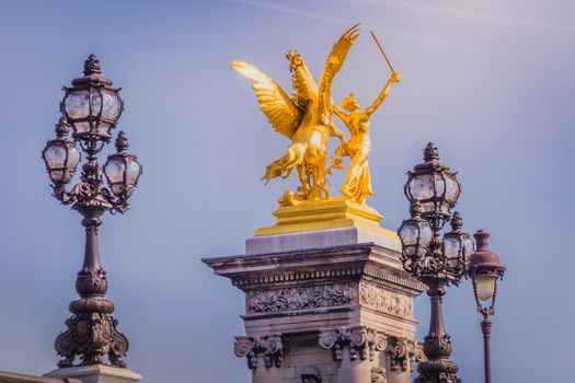 Street lights and statues in Pont Alexandre III, Paris, france