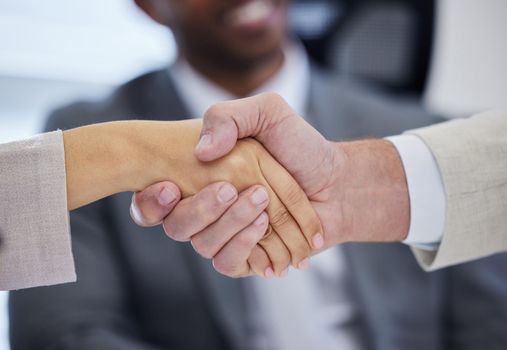 See where good negotiation skills gets you. unrecognisable businesspeople shaking hands in a modern office.