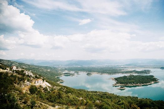 Aerial view of Slano Lake. Salt lake in Niksic, Montenegro. Grainy film in the style of old photos