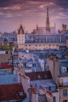 Saint Chapelle and quarter latin roofs at sunrise Paris, France