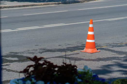 Traffic road safety background orange cone street work car asphalt, concept warning plastic for caution for security equipment, maintenance bright. Concrete copy dividing,