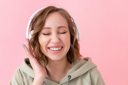 Happy teeth smile woman listen music headphones