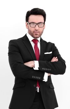 Portrait of businessman standing with arms crossed