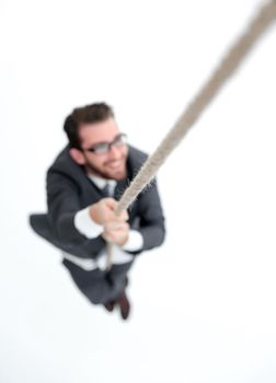 successful businessman climbing the rope