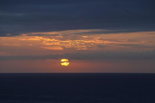 Dawn Break Sun Over Overcast Ocean Horizon