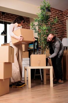 Married man and woman moving in new house bought together