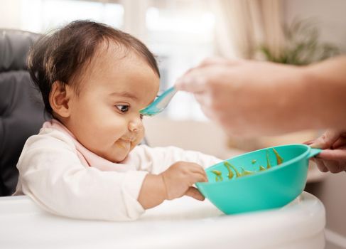 I hope youre going to refill this. an adorable baby girl eating her food.