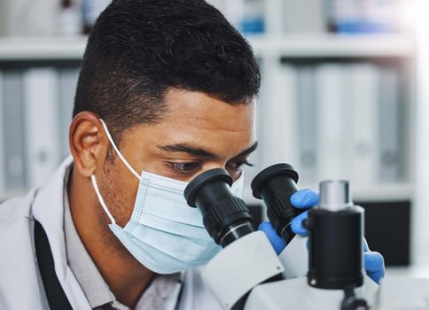 If you believe it, you can see it. a young male researcher working in a laboratory.