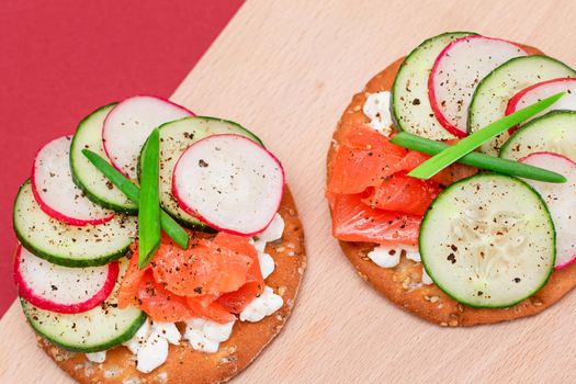 Cracker Sandwiches with Salmon, Cucumber, Radish, Cottage Cheese and Green Onions