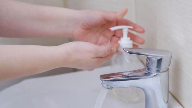 Woman Puts Antibacterial Soap On Her Hands