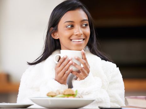 Start your day off with a good breakfast. a young woman having brunch.