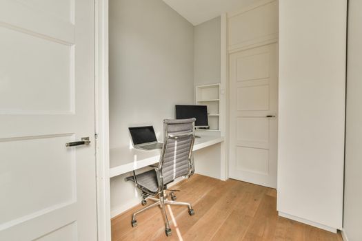 Spacious room with working desk and settee