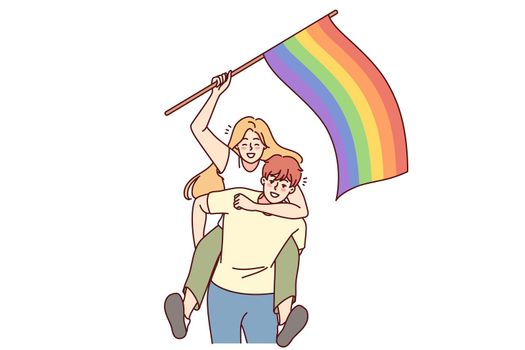 Happy couple with LGBT flag