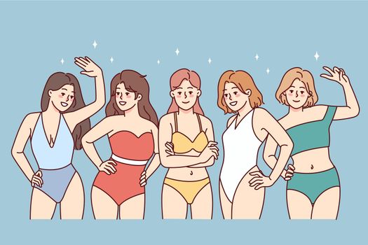 Women in swimsuits posing together