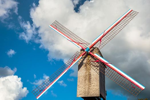 Rustic wooden windmills in idyllic Bruges public park, Belgium