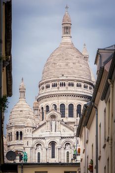 Sacre coeur basilica above Montmartre summit , Paris, France