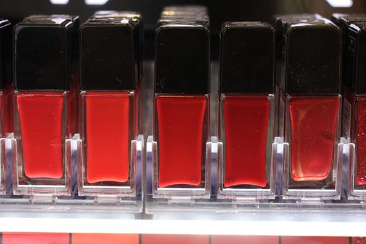 Nailpolish display in a store showing all various colors