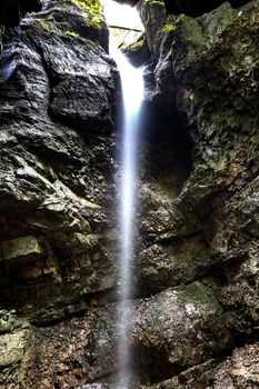 Small waterfall in narrow gorge at Breitachklamm, Germany