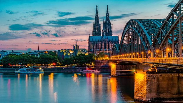 Cologne Koln Germany during sunset, Cologne bridge with cathedral