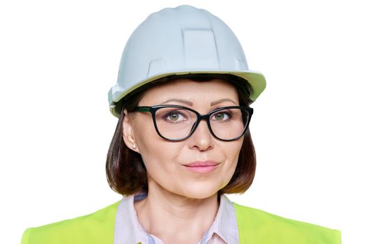 Female industrial worker in protective hard hat and vest on white isolated background