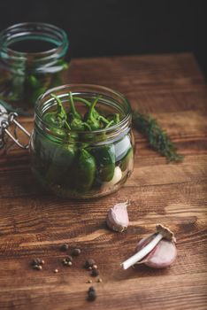 Fresh Jalapeno Peppers in a Glass Jar for Pickling