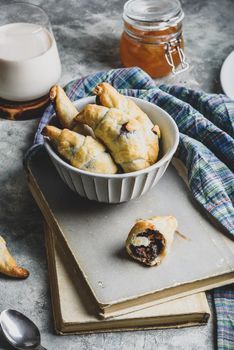 Croissants stuffed with nuts and chocolate spread