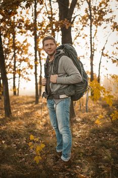 Backpacker Hiking In Autumn Nature Outdoors