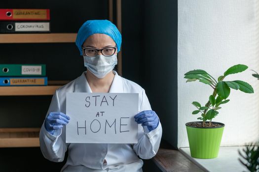 Stay At Home Sign From Female Doctor