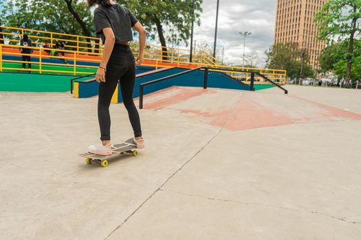Latina teen woman rollerblading in an outdoor park in Nicaragua