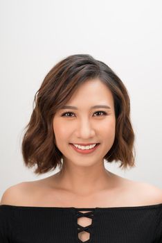 Close up of young Asian beautiful woman with smiley face.