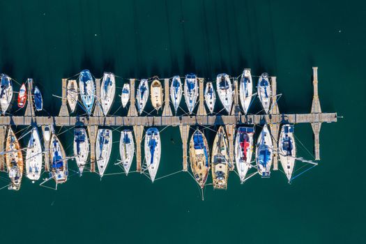 Life at sea is a whole new experience. High angle shot of boats at a seaside harbour.